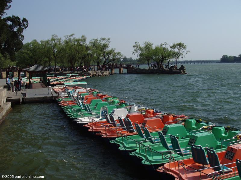 Paddleboats along Kunming Lake shoreline in Beijing's Summer Palace