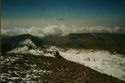 Kari lake and peaks of Mt. Ararat as seen from south peak of Mt. Aragats, Armenia
