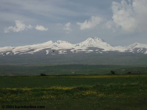 Field and Mt. Aragats seen from near Artashavan, Armenia
