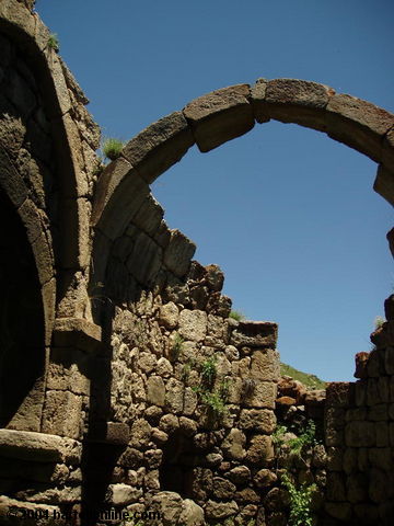Stone archway in ruins of Tsakats Kar monastery near Artabuynk, Armenia
