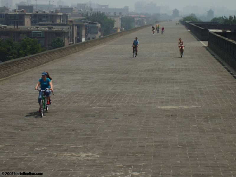 Bicyclists atop the city wall around Xi'an, Shaanxi, China