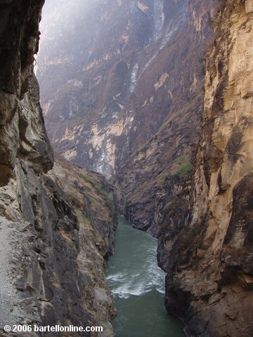 View from a narrow cliffside trail through Tiger Leaping Gorge in Yunnan, China
