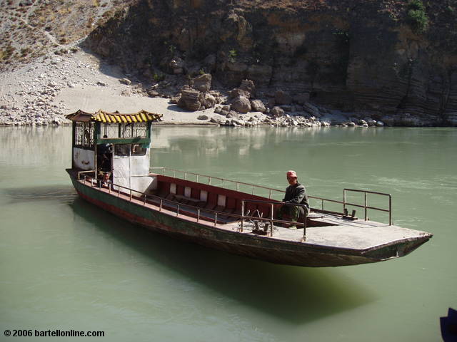 Old ferry crossing the Jinsha River to Daju on the trek through Tiger Leaping Gorge in Yunnan, China