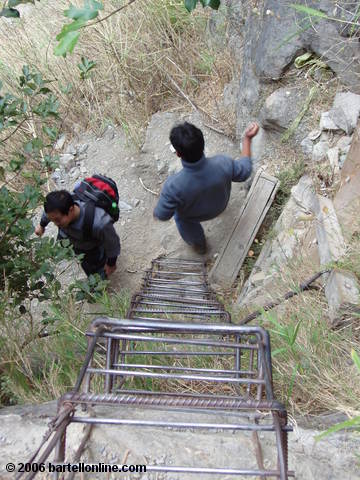 A ladder on a steep path into Tiger Leaping Gorge in Yunnan, China